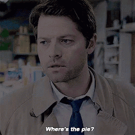 a man in a trench coat and tie says where 's the pie ?