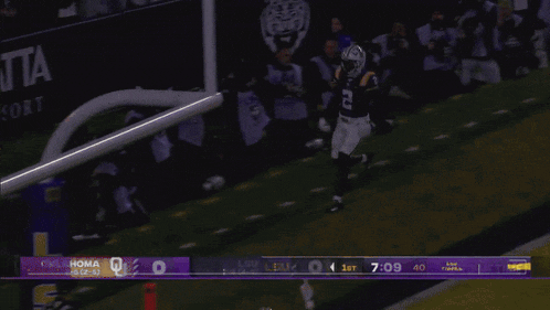 a football game is being played at lsu and the score is touchdown
