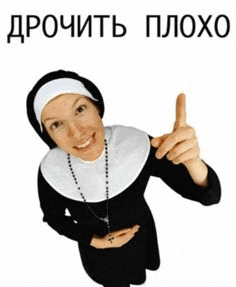 a nun is smiling and giving a thumbs up sign