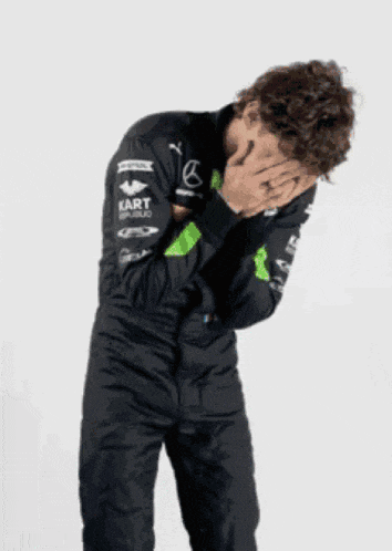 a werewolf is covering his face with his hands