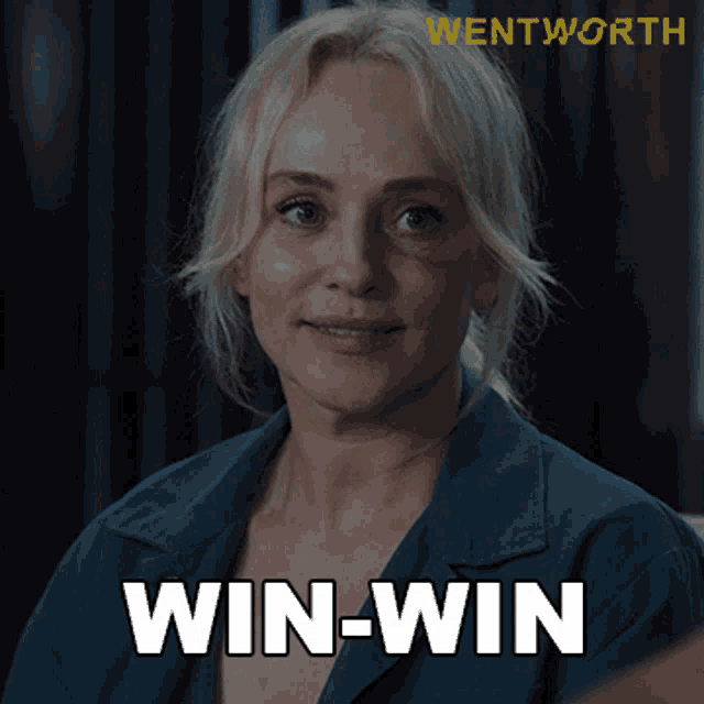a woman in a blue shirt with the words win-win written on her face