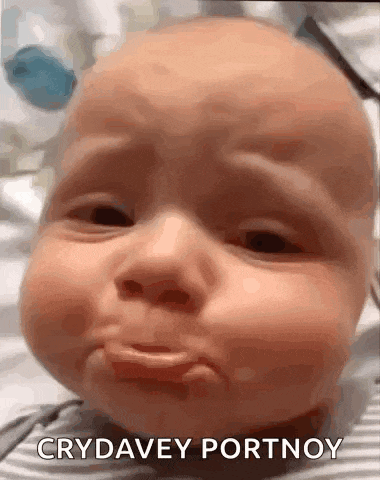 a baby is crying and making a funny face with the caption crydavey portnoy .