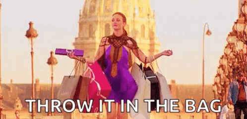 Shop Living In Light Sale GIF - Shop Living In Light Sale Throw It In The Bag GIFs