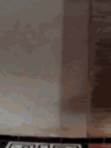 a close up of a microwave with a few spots of rust on it