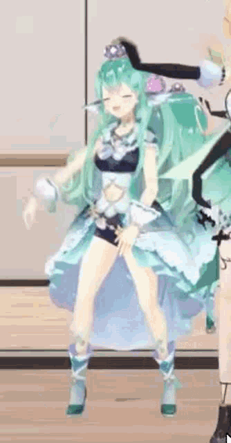 a girl with green hair is dancing in a video game while another girl looks on .