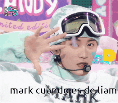 a man wearing a ski helmet and goggles with the words mark cuandores de liam below him