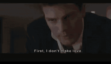 a man in a suit and tie is saying `` first , i don 't make love '' .
