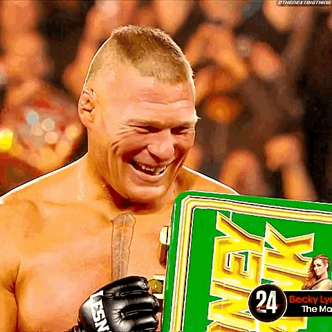 a man is holding a green sign that says ' gxr ' on it