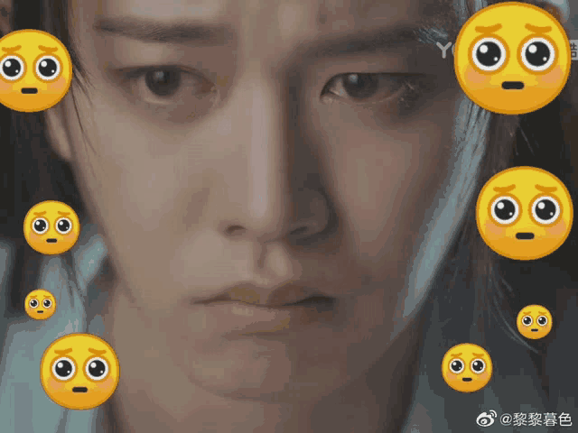 a close up of a person 's face with a bunch of yellow smiley faces around it