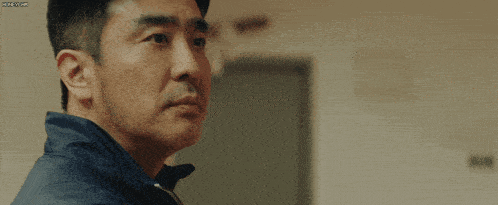 a close up of a man 's face with a watermark that says hdxcvb