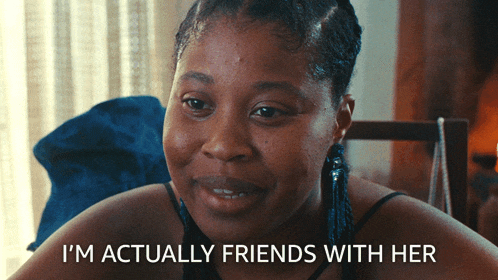 a woman is smiling with the words i 'm actually friends with her below her