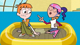 a boy and a girl are sitting in a yellow raft