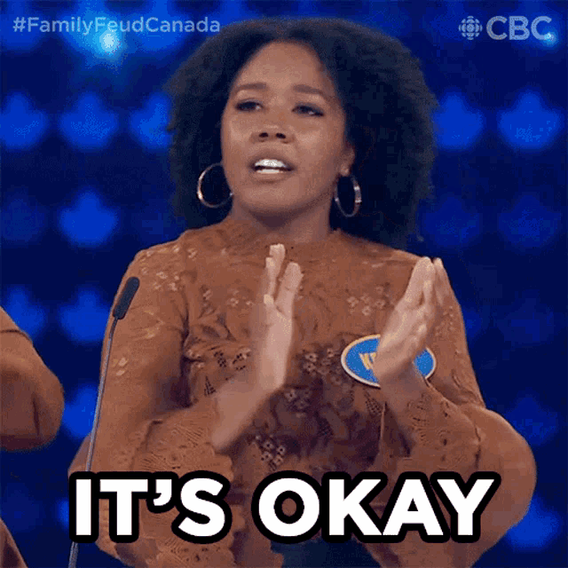 a woman clapping with the words " it 's okay " written below her
