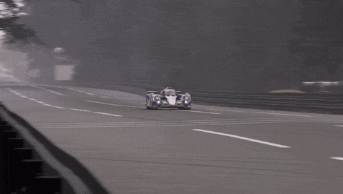 a race car has the number 8 on the side of it