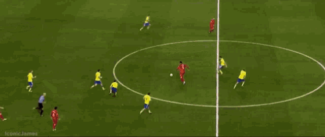 a soccer game is being played on a field sponsored by normann