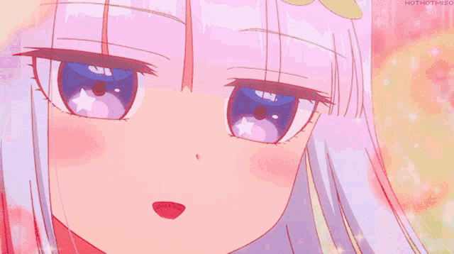 a close up of a girl 's face with hothotmiso written on the bottom right