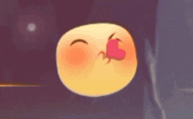 a cartoon smiley face is blowing a kiss and has a red heart on its nose .
