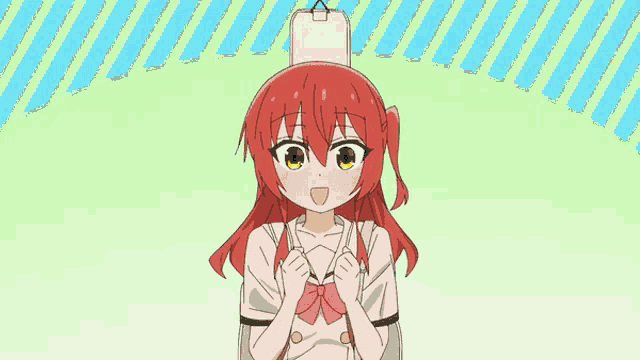 a girl with red hair is holding a guitar case on her back
