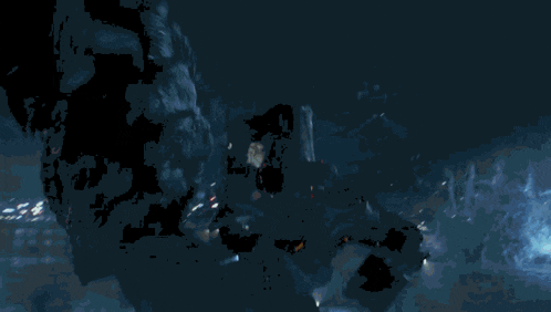 a large fireball is coming out of the ground in the dark
