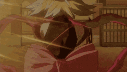 a cartoon character with a pink bow on his chest