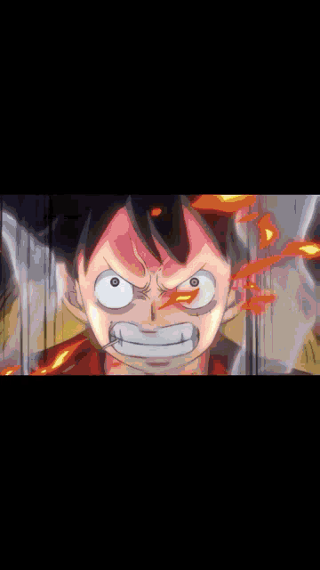 a close up of a cartoon character 's face with a very angry expression .