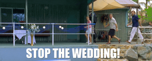 a sign that says stop the wedding in white letters on a blue background