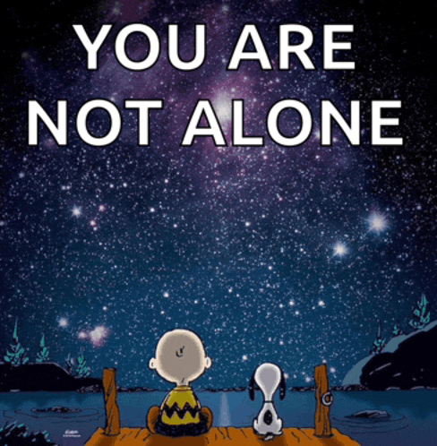 charlie brown and snoopy sitting on a dock looking at the stars