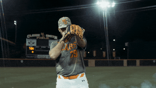 a baseball player wearing a gray shirt with the number 79 on it