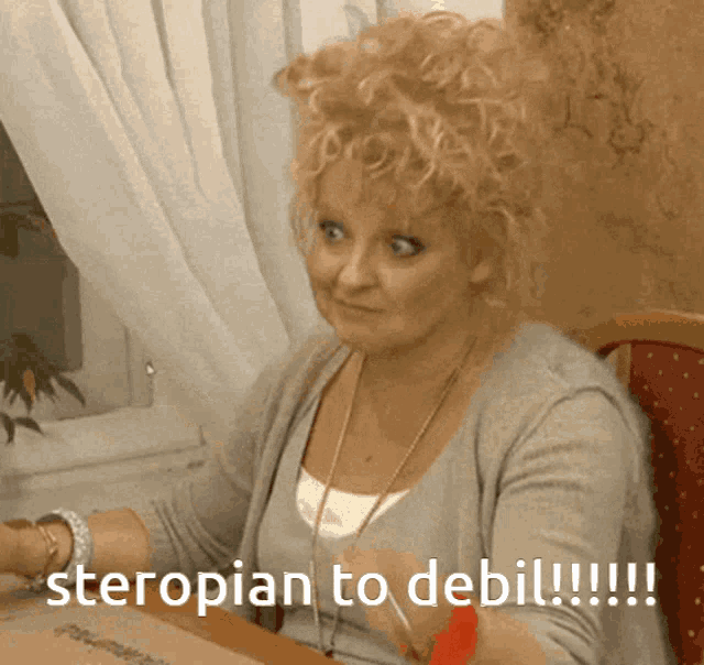 a woman sitting at a table with the words " steropian to debil " written on it