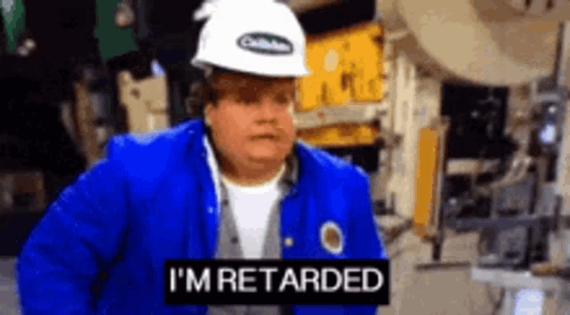 a man wearing a hard hat and a blue jacket is saying i 'm retarded