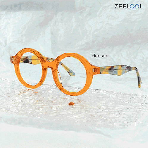 a pair of glasses with the brand name henson on it