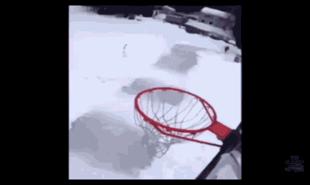 a basketball hoop in the snow with a purple border that says ' basketball hoops ' on it