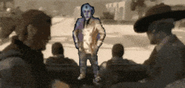 a pixelated image of a man standing in a crowd