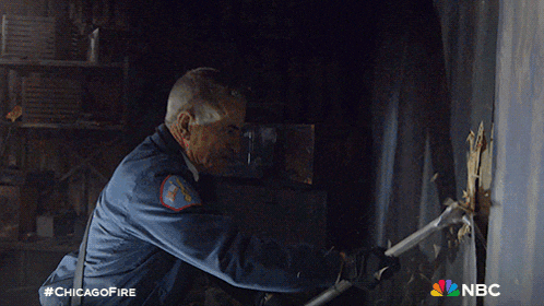 a nbc ad for chicago fire shows a person breaking a door