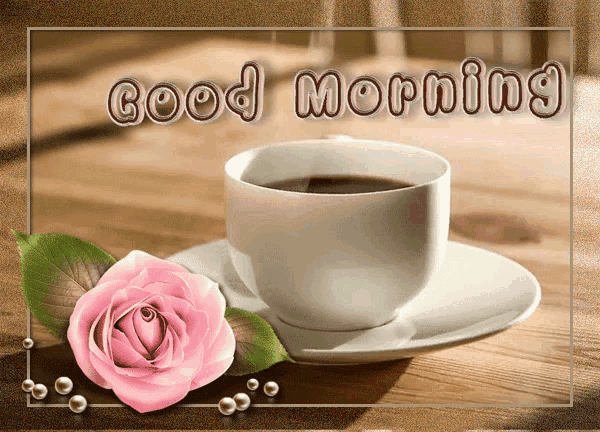 a cup of coffee sits on a saucer next to a pink rose with the words good morning written above it
