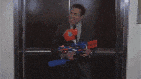 a man in a suit and tie is standing in a hallway holding a folder