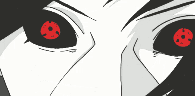 a drawing of a person 's eyes with a red pupil