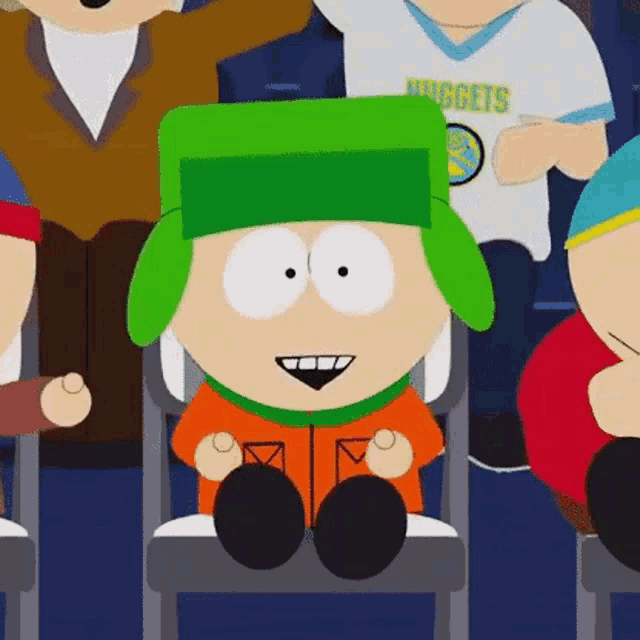 a cartoon character from south park is sitting in a chair with a green hat on .
