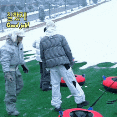 a group of people standing in the snow with the words good job written on the bottom