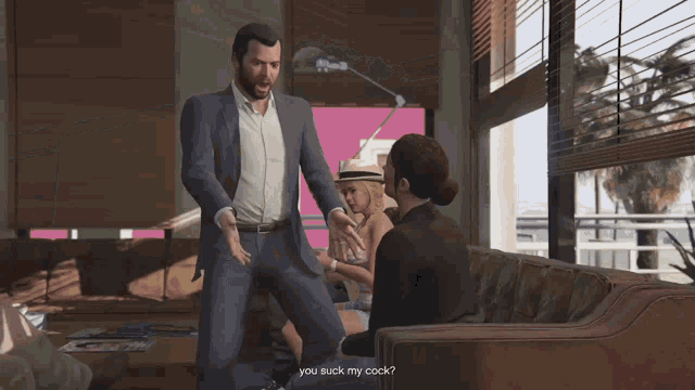 a woman with a red necklace is talking to a man