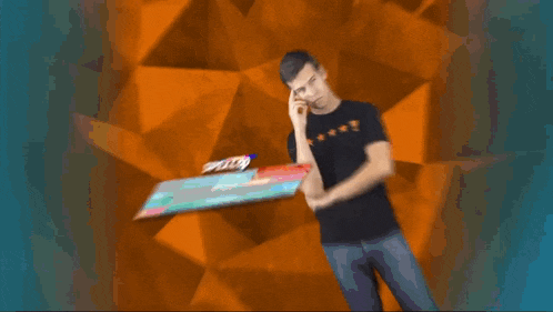 a man talking on a cell phone with the name spencer on the bottom right