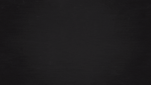 a close up of the letter z on a black background .