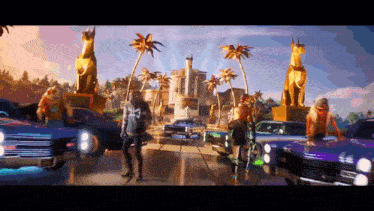 a group of people are walking down a street in front of a building with the word hollywood on it