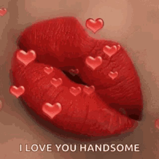 a close up of a woman 's lips with red lipstick and hearts coming out of them .