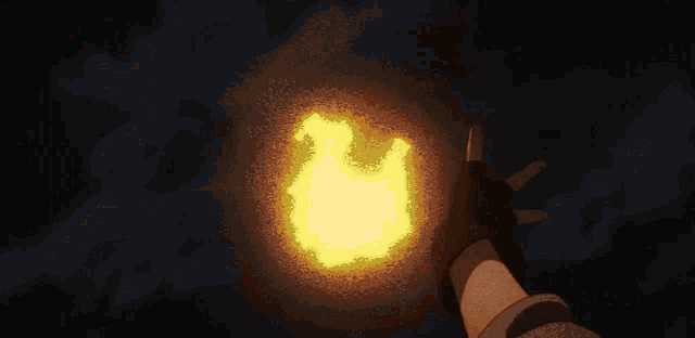 a person is holding a torch in their hand and it is glowing brightly