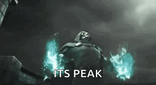 a man in a cape is holding a fireball in his hands and says `` its peak '' .