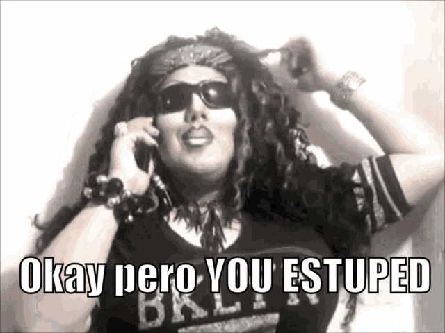 a woman wearing sunglasses and a bandana is talking on a cell phone and the caption says okay pero you estuped