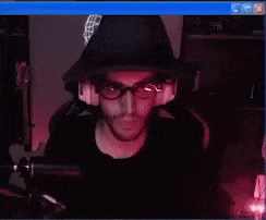 a computer screen shows a man in a top hat