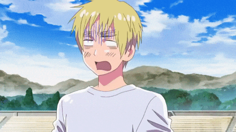 a boy with blonde hair making a funny face with his mouth open