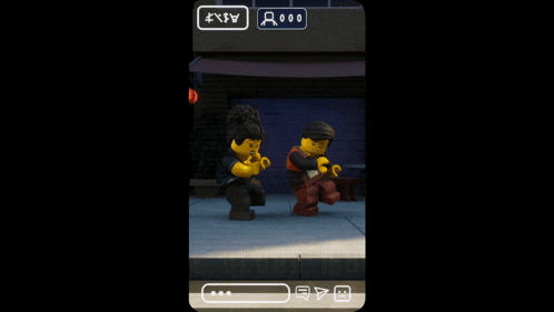 a phone screen shows two lego figures and the words " the blood moon "